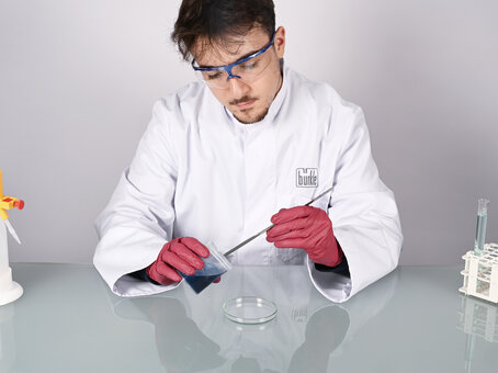 Double-ended spatula with an angular/rounded tip, made of stainless steel