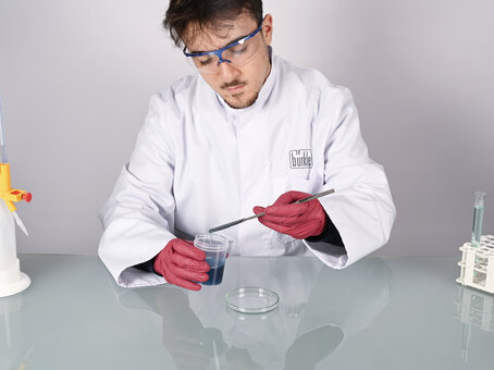 Double-ended spatula with an angular/rounded tip, made of stainless steel