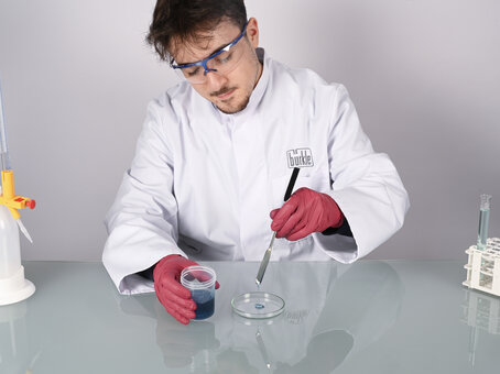 Double-ended spatula with an angular/rounded tip, made of stainless steel